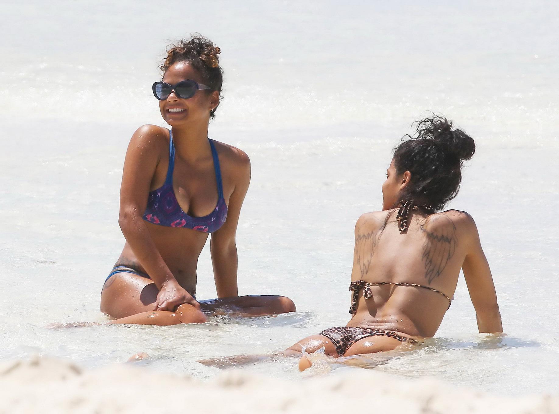 16P Christina Milian and Karrueche Tran flaunts their taut bikini bodies at the beac