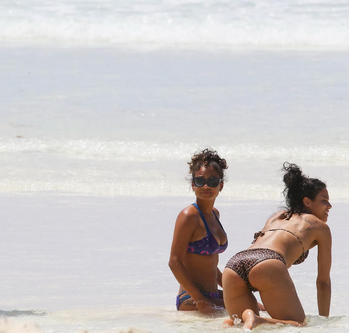 16P Christina Milian and Karrueche Tran flaunts their taut bikini bodies at the beac