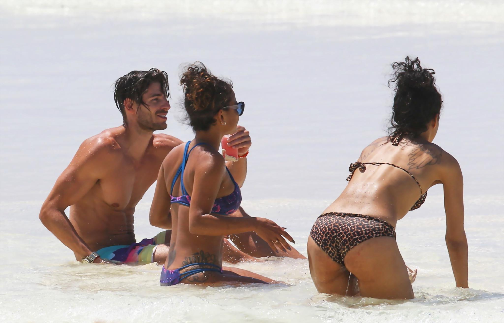 16P Christina Milian and Karrueche Tran flaunts their taut bikini bodies at the beac