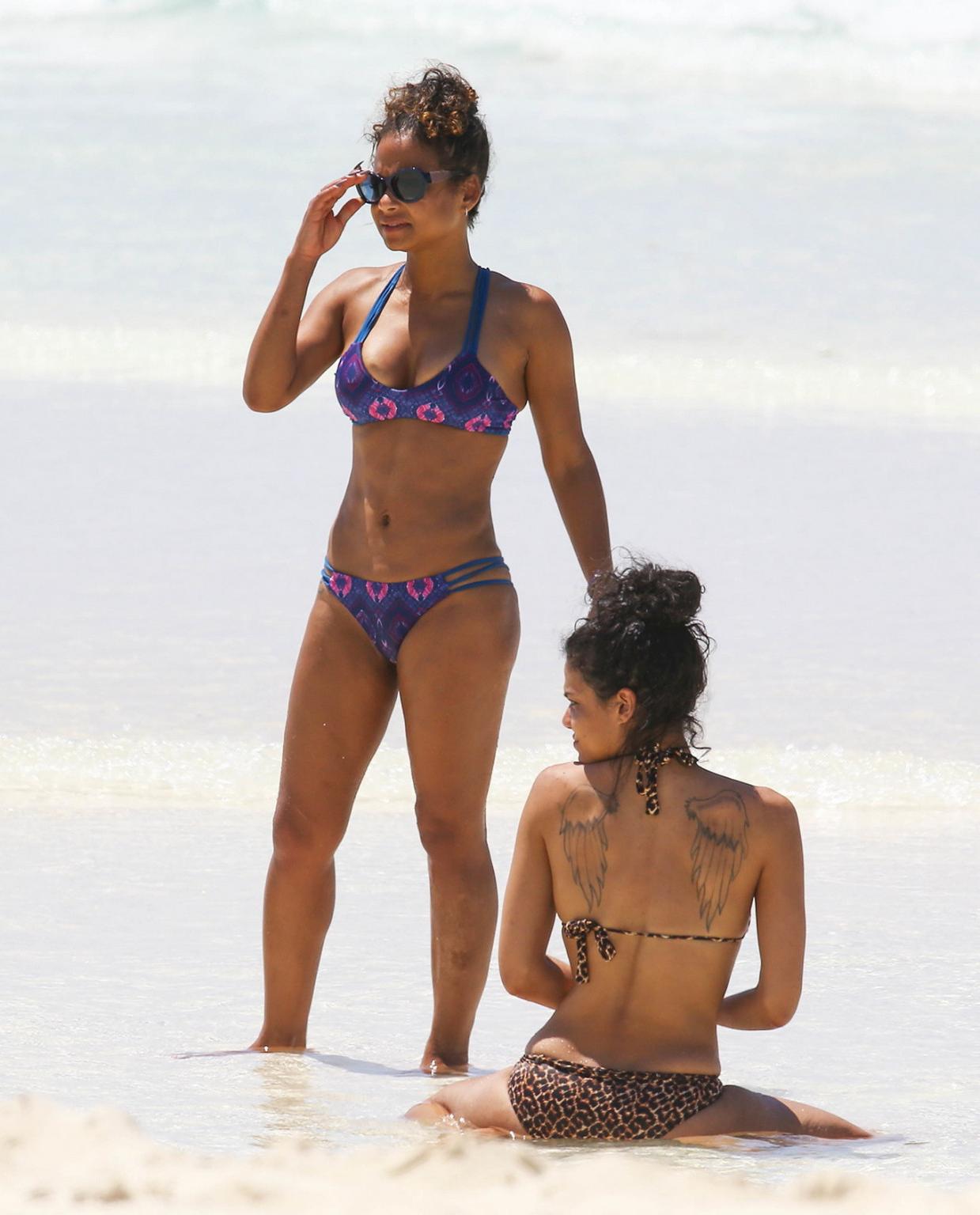 16P Christina Milian and Karrueche Tran flaunts their taut bikini bodies at the beac