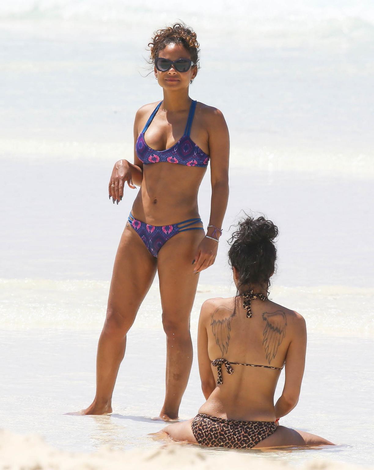 16P Christina Milian and Karrueche Tran flaunts their taut bikini bodies at the beac