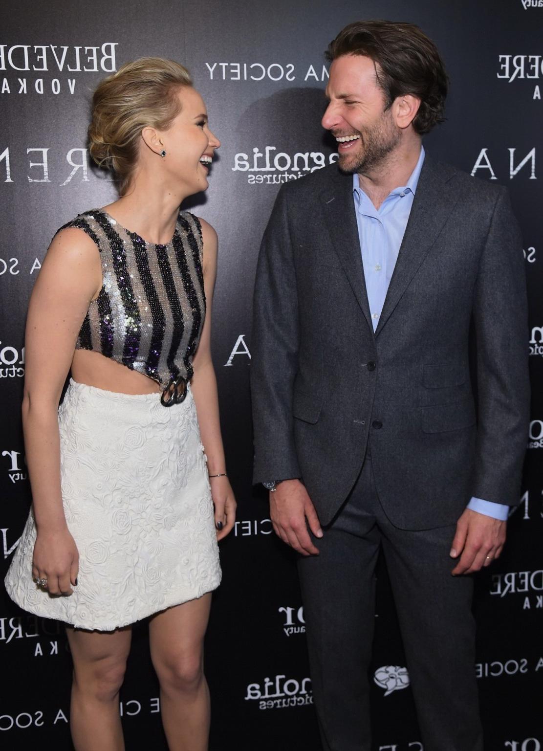 16P Jennifer Lawrence busty and leggy wearing revealing mini dress at Serena screeni
