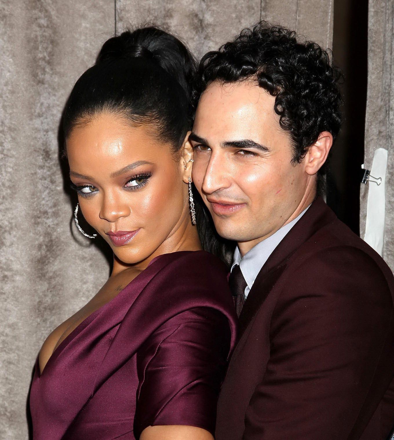 16P Rihanna showing cleavage and upskirt at the Zac Posen Fashion Show in NYC
