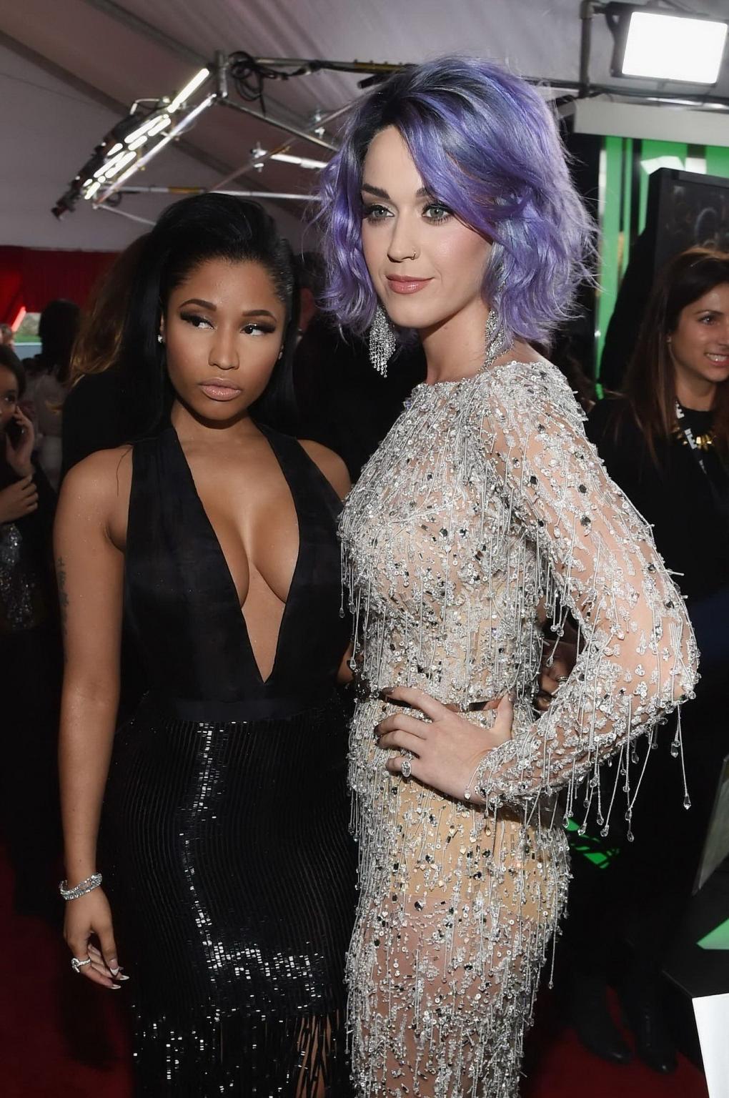 16P Nicki Minaj shows off her huge boobs in black transparent low cut dress at the 5