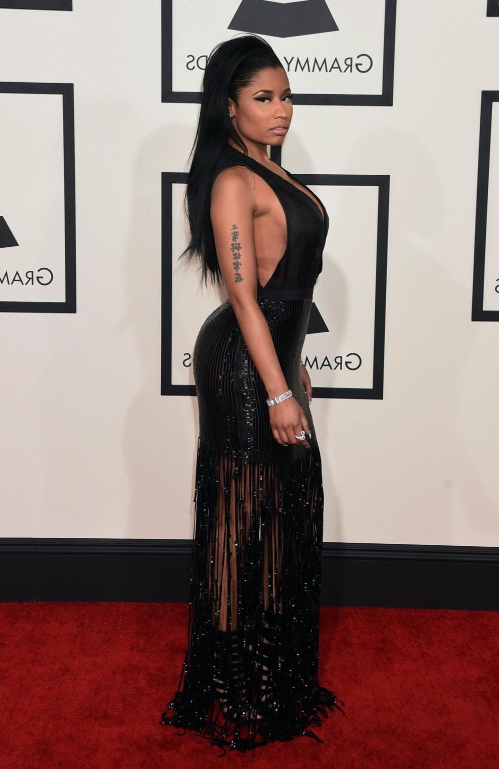 16P Nicki Minaj shows off her huge boobs in black transparent low cut dress at the 5