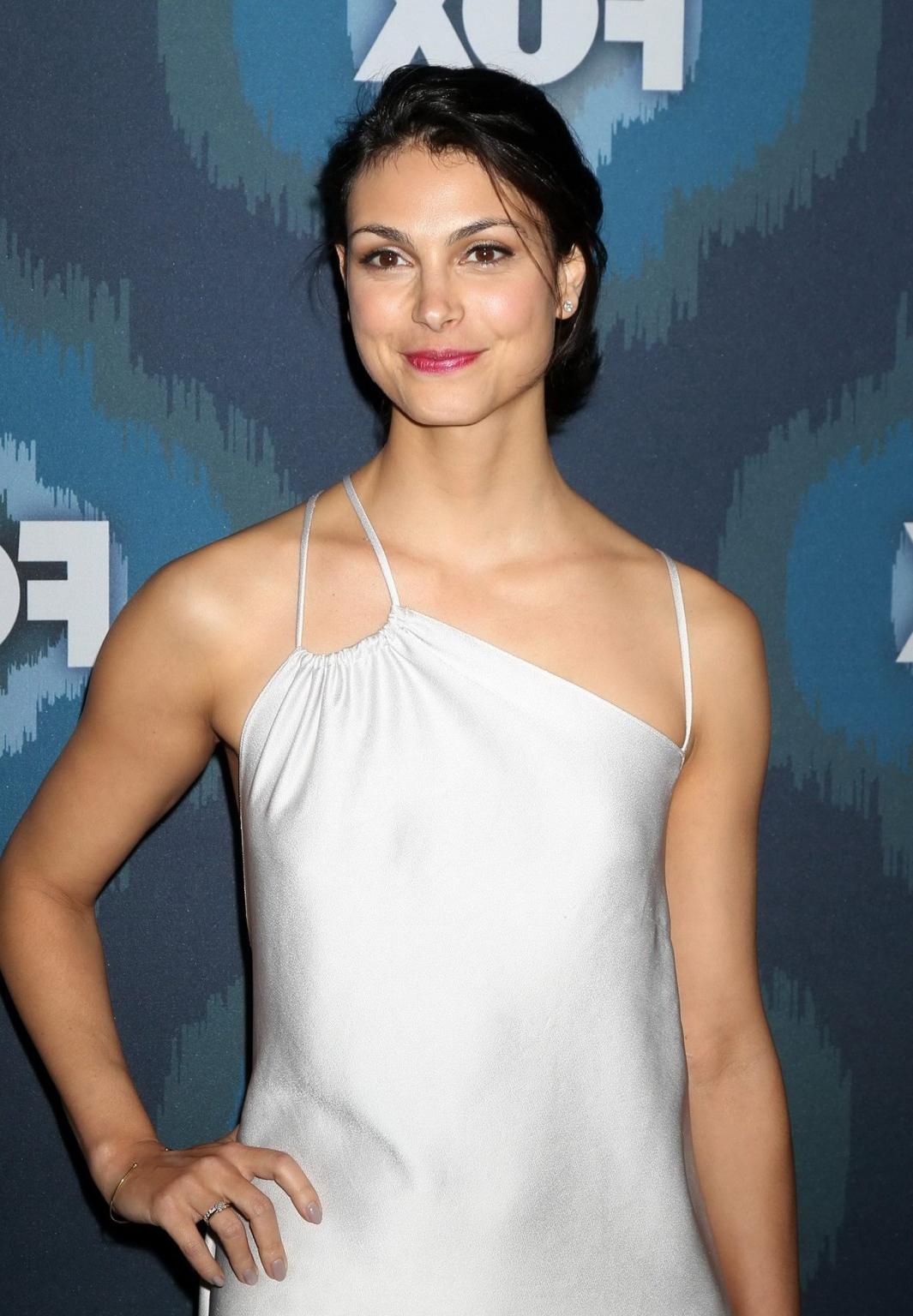 16P Morena Baccarin showing pokies braless in white dress at FOX AllStar Party in Pa