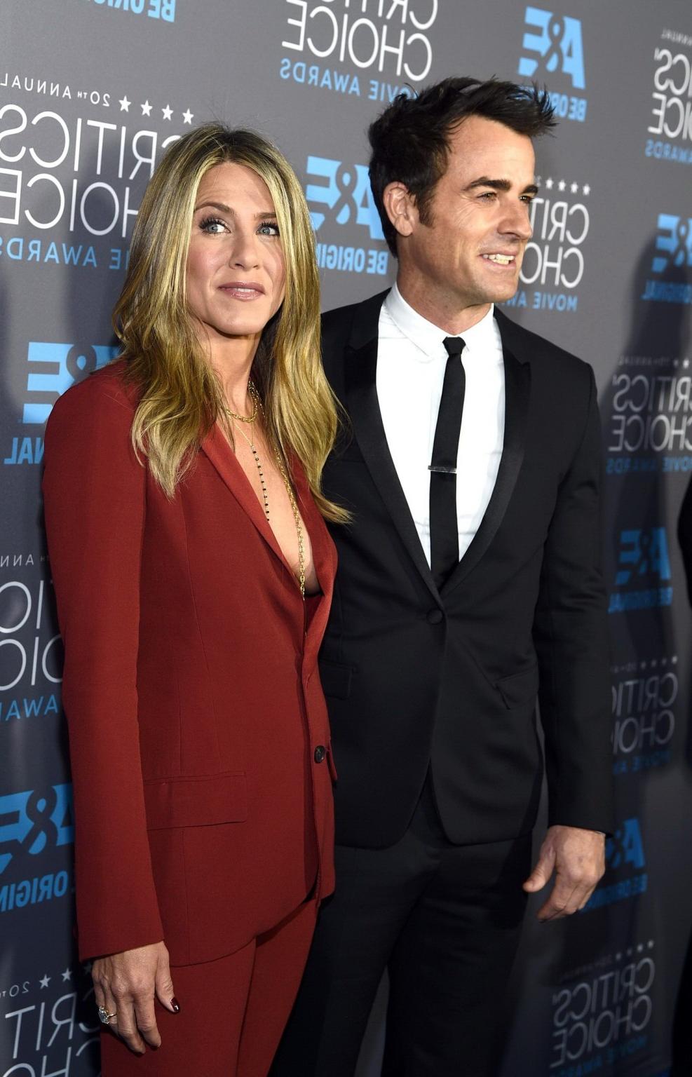 16P Jennifer Aniston braless showing huge cleavage at the 20th Annual Critics Choice