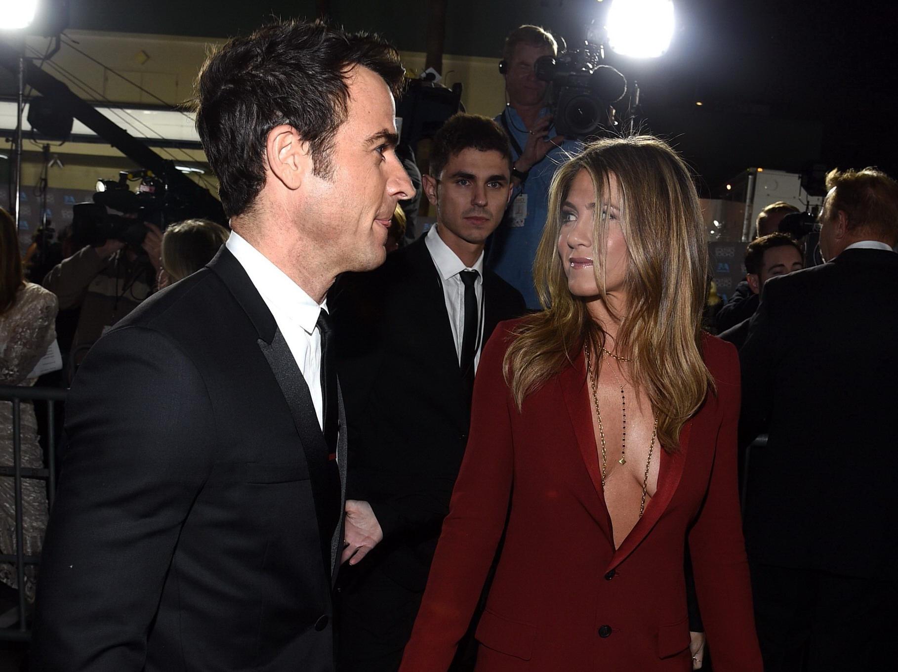16P Jennifer Aniston braless showing huge cleavage at the 20th Annual Critics Choice