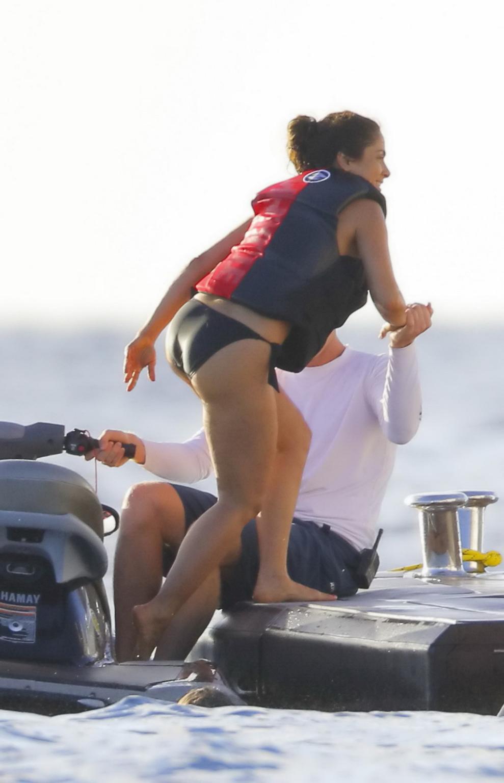16P Salma Hayek shows off her big boobs and ass in tiny black bikini at a yacht in S