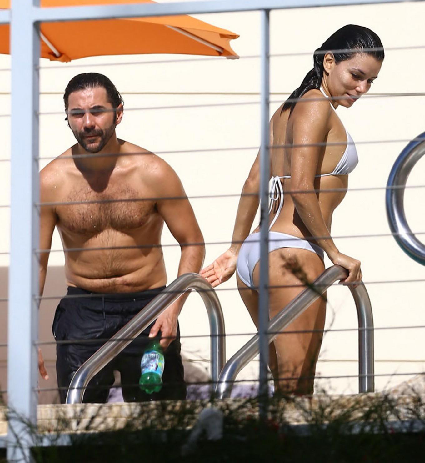 16P Eva Longoria showing off her bikini body at the pool in Miami