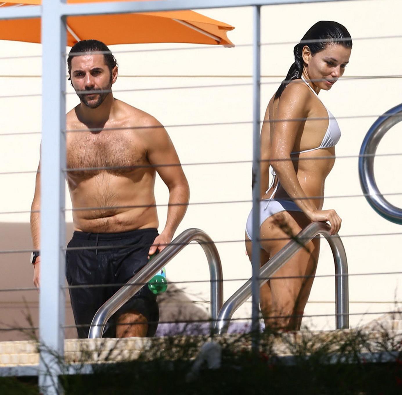 16P Eva Longoria showing off her bikini body at the pool in Miami