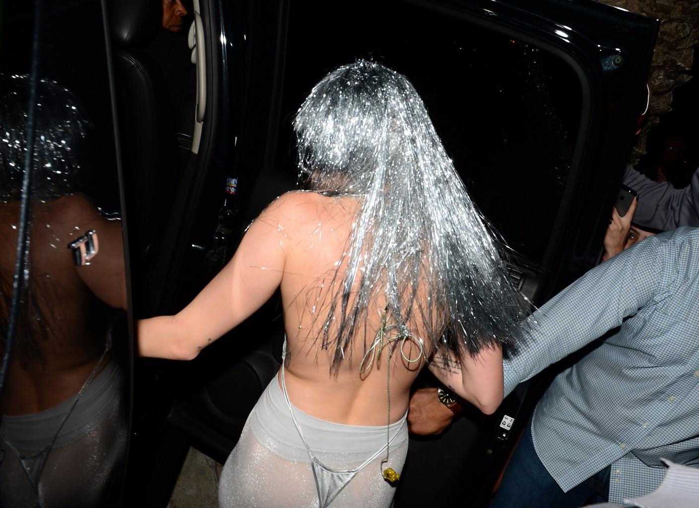 16P Miley Cyrus topless but wearing pasties and pantyhose at Art Basel in Miami
