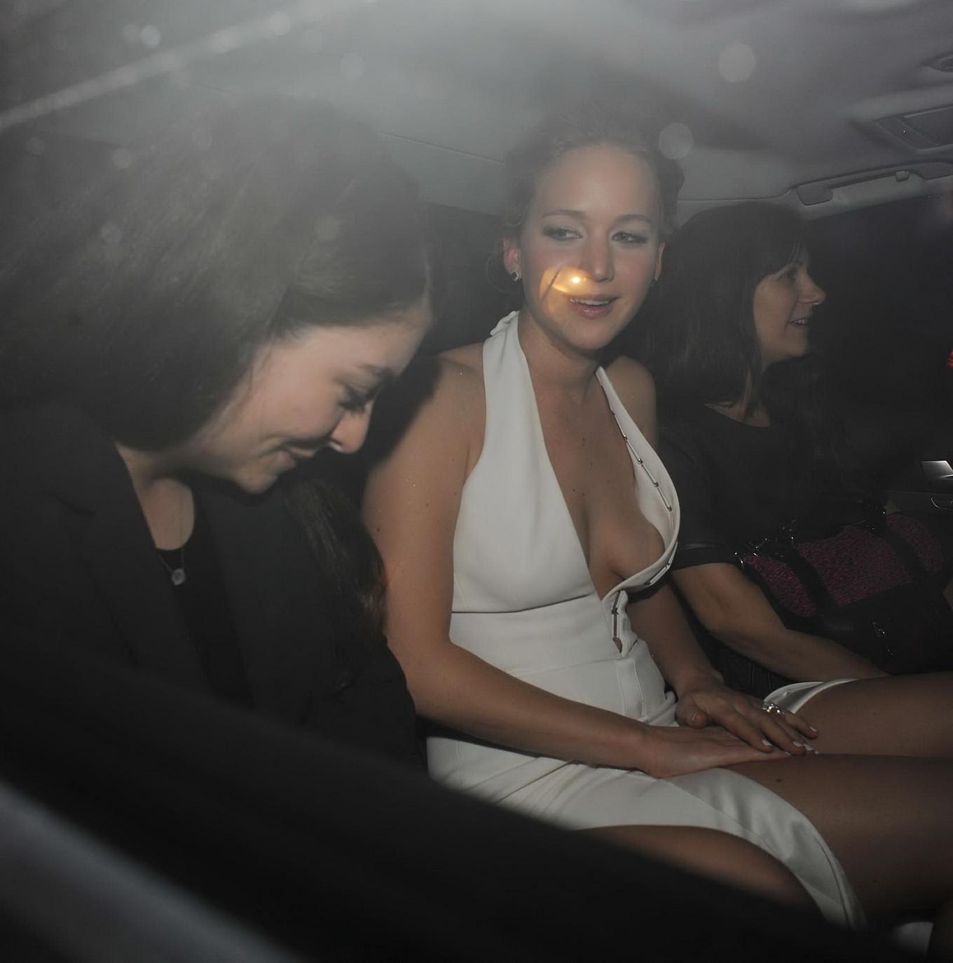 16P Jennifer Lawrence wardrobe malfunction while leaving The Hunger Games  Mockingja