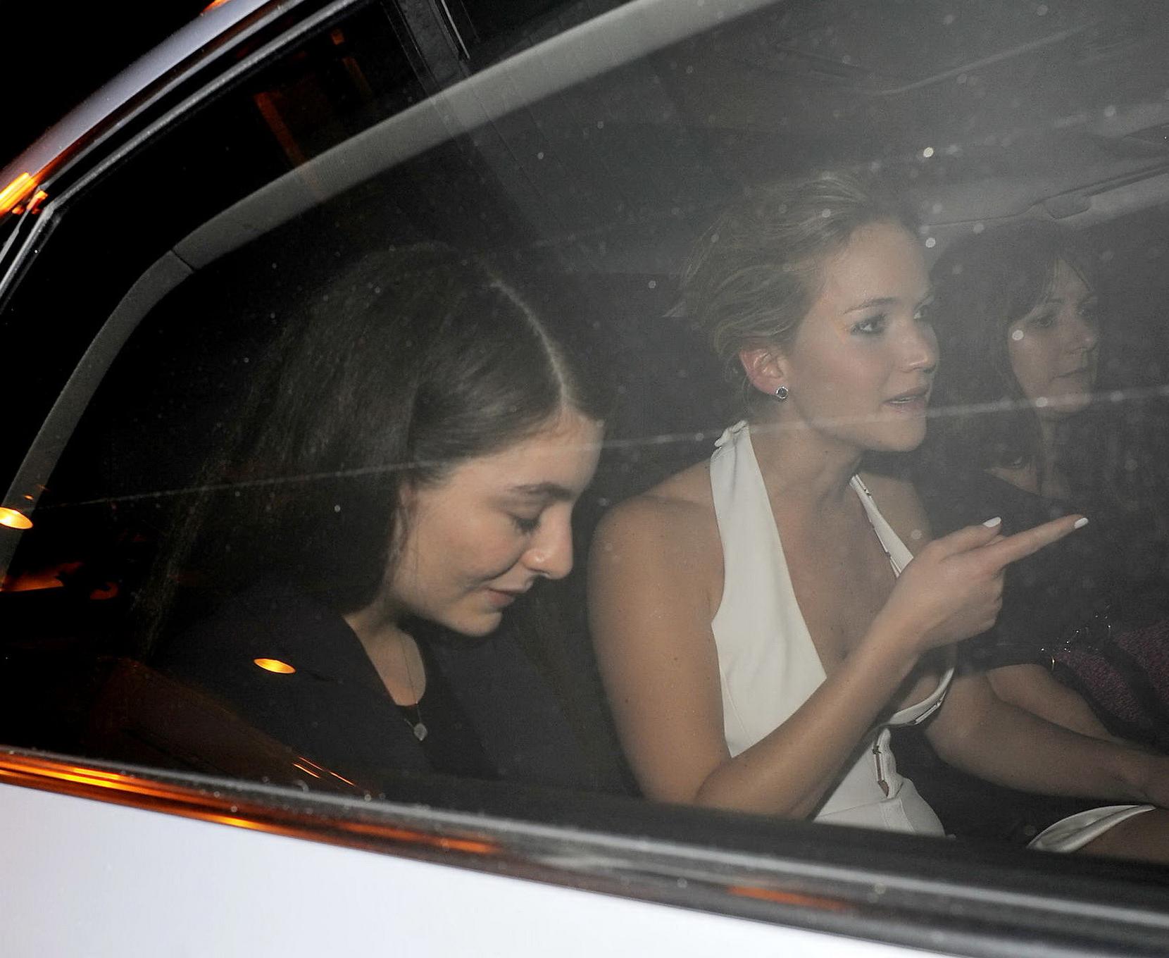 16P Jennifer Lawrence wardrobe malfunction while leaving The Hunger Games  Mockingja