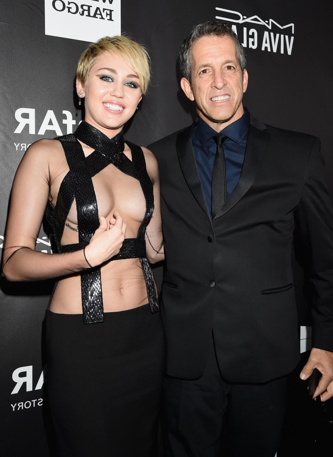 16P Miley Cyrus seethru covering only nipples at amfAR LA Inspiration 2014 Gala in H