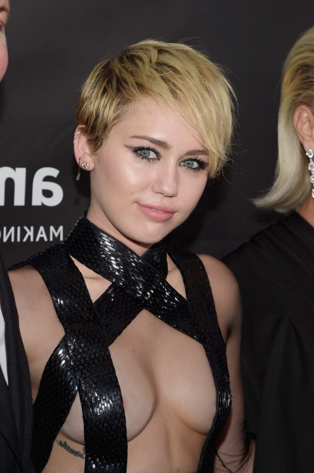 16P Miley Cyrus seethru covering only nipples at amfAR LA Inspiration 2014 Gala in H
