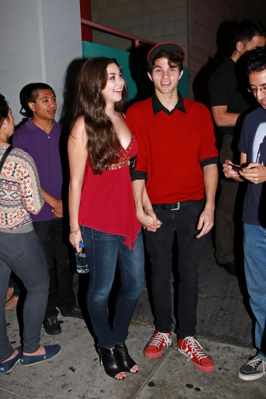 16P Kira Kosarin showing huge cleavage in a hot red top and jeans while leaving the 