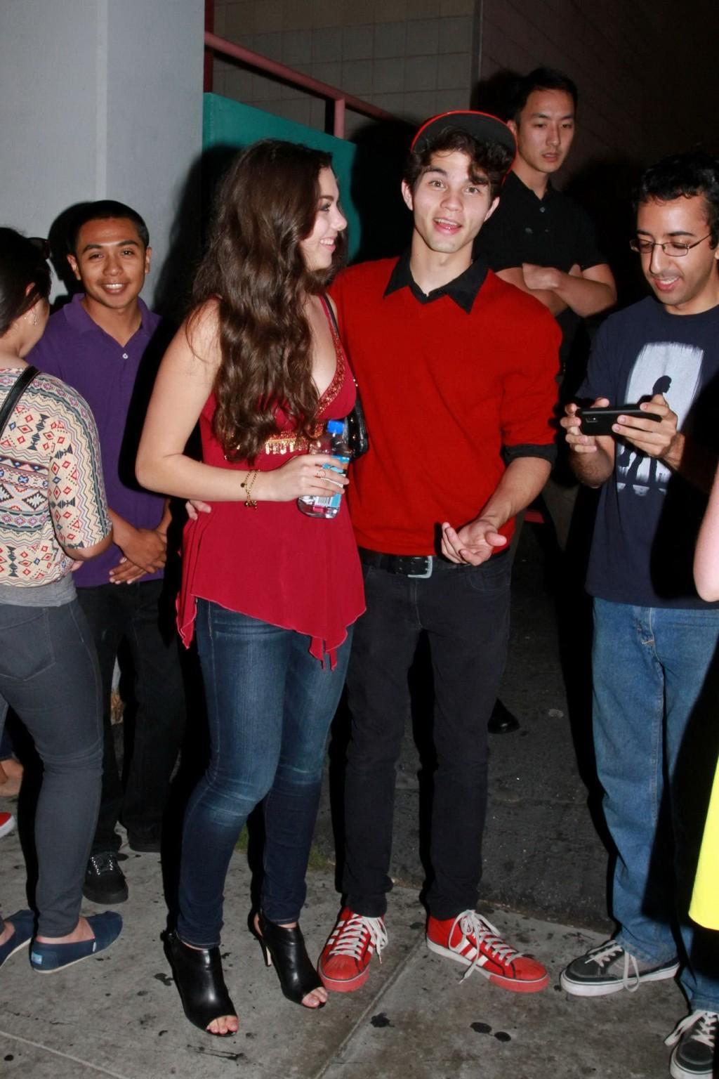 16P Kira Kosarin showing huge cleavage in a hot red top and jeans while leaving the 