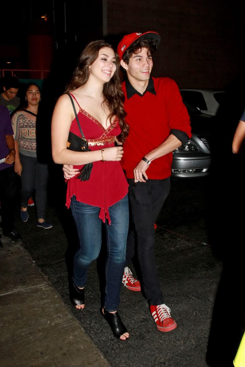 16P Kira Kosarin showing huge cleavage in a hot red top and jeans while leaving the 