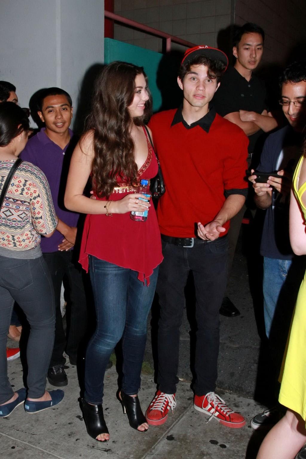16P Kira Kosarin showing huge cleavage in a hot red top and jeans while leaving the 