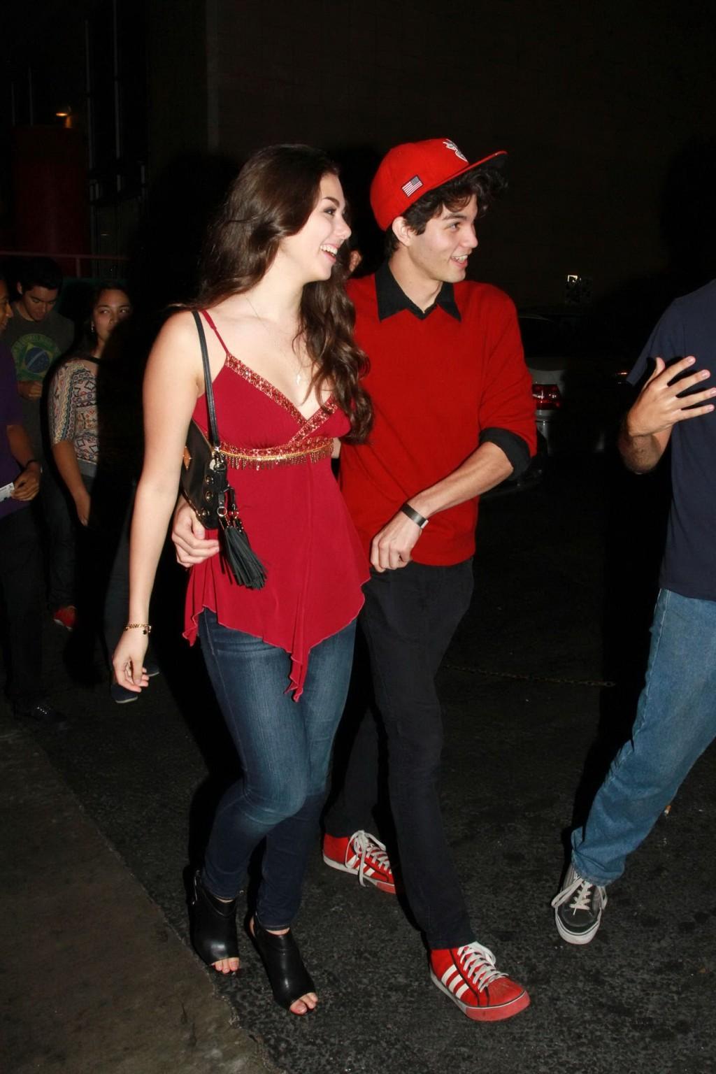16P Kira Kosarin showing huge cleavage in a hot red top and jeans while leaving the 