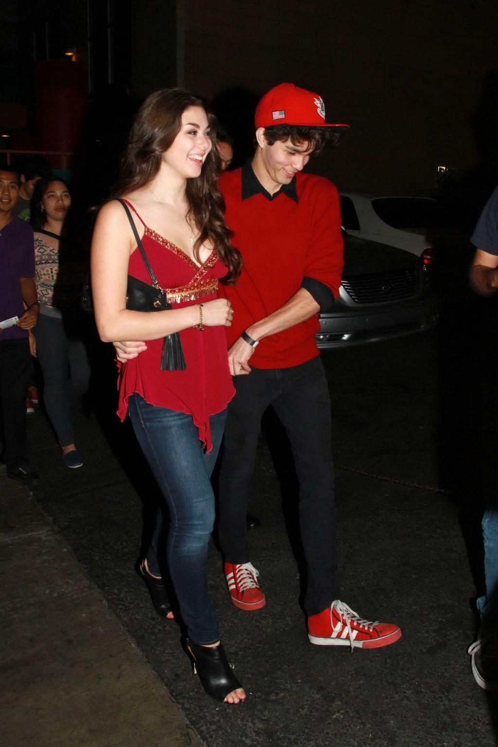 16P Kira Kosarin showing huge cleavage in a hot red top and jeans while leaving the 
