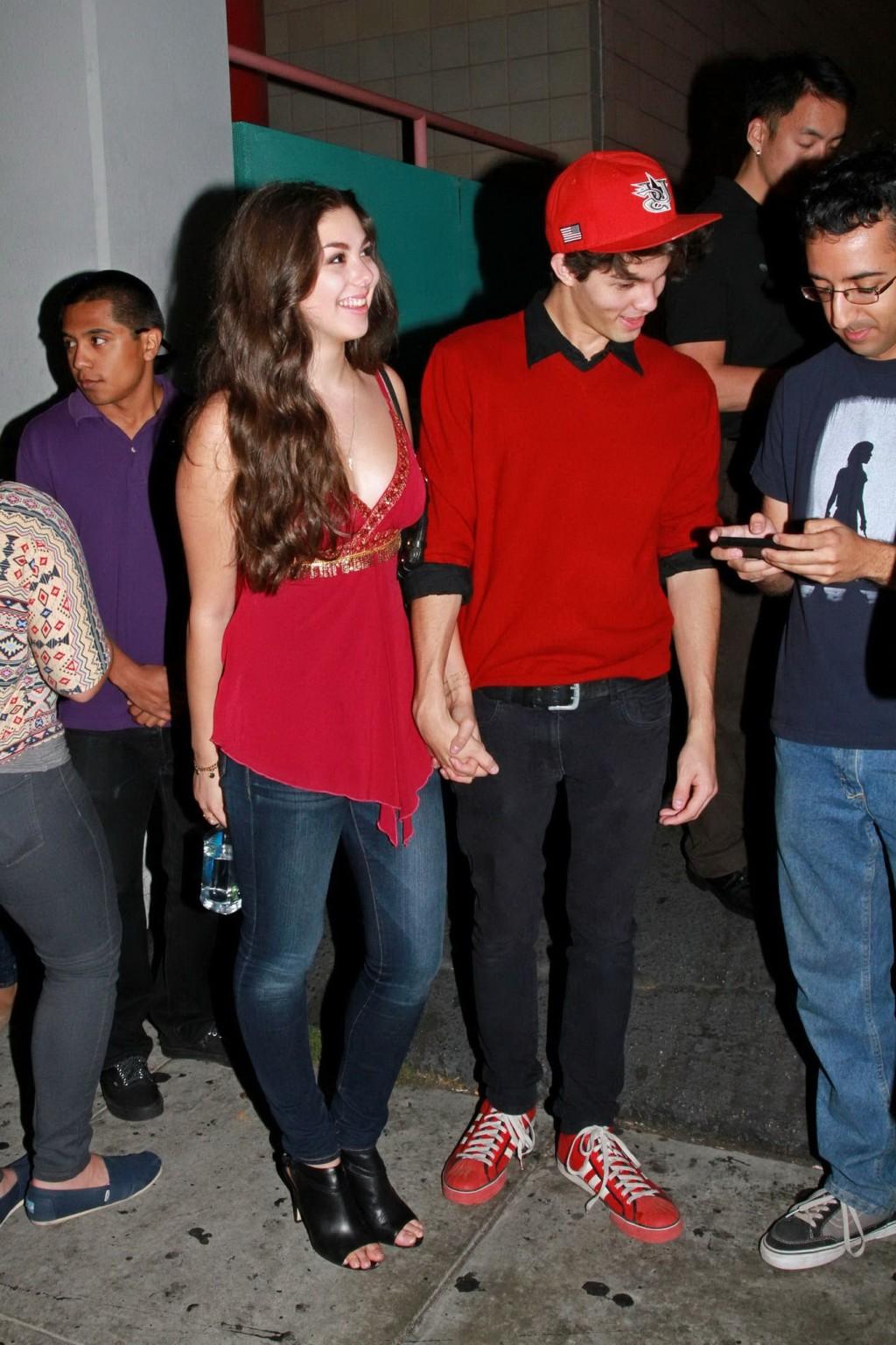 16P Kira Kosarin showing huge cleavage in a hot red top and jeans while leaving the 