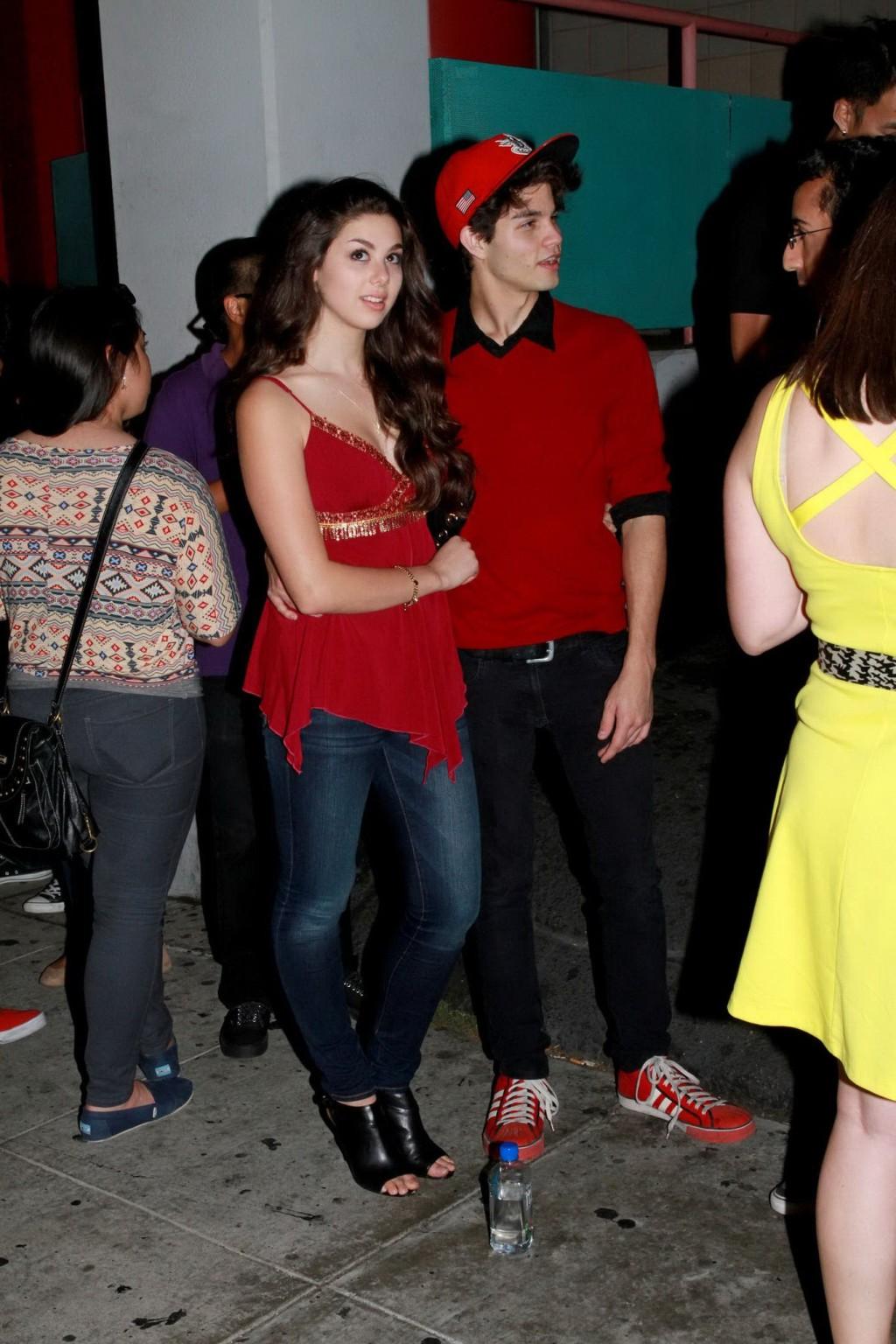 16P Kira Kosarin showing huge cleavage in a hot red top and jeans while leaving the 
