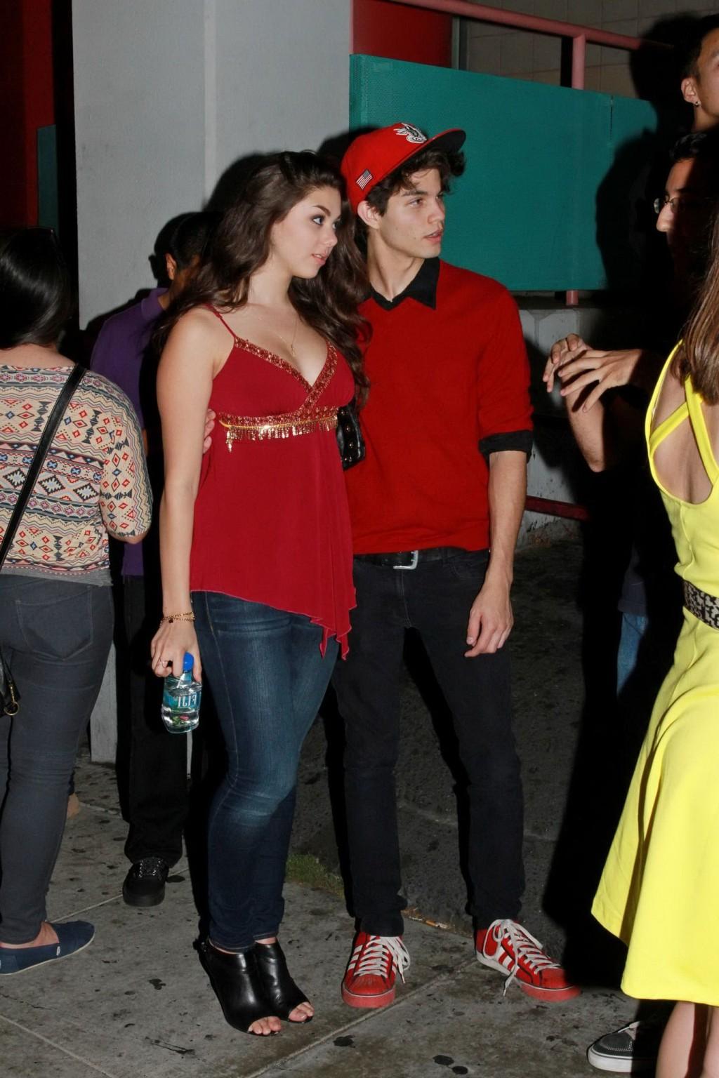 16P Kira Kosarin showing huge cleavage in a hot red top and jeans while leaving the 