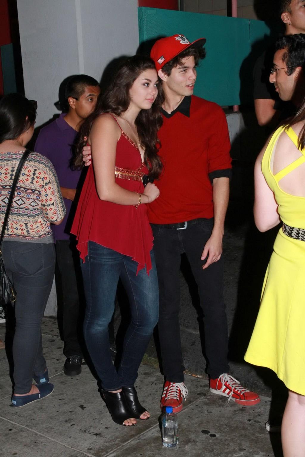 16P Kira Kosarin showing huge cleavage in a hot red top and jeans while leaving the 