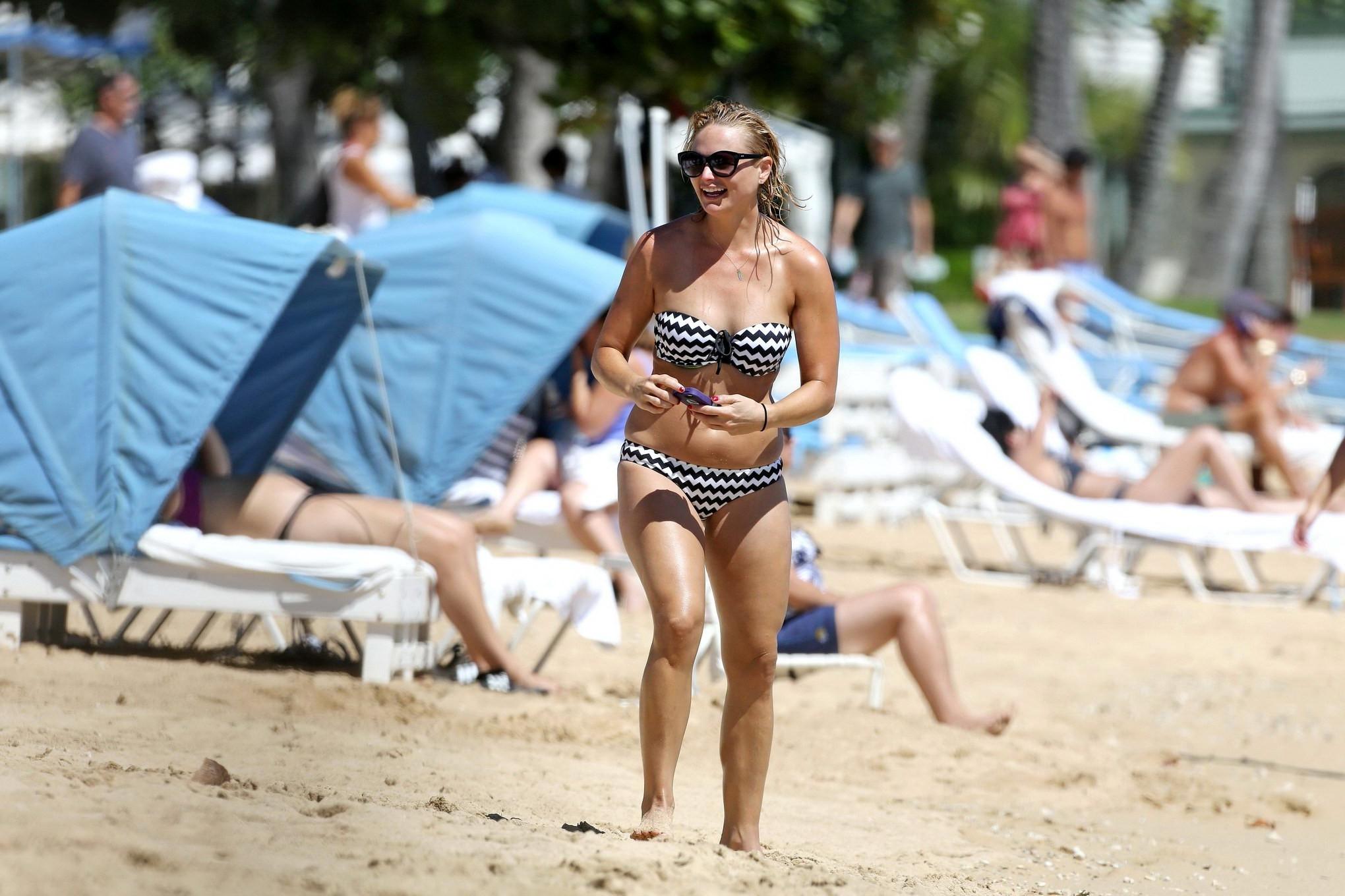 16P Miranda Lambert wearing a strapless monochrome bikini on a Hawaiian beach