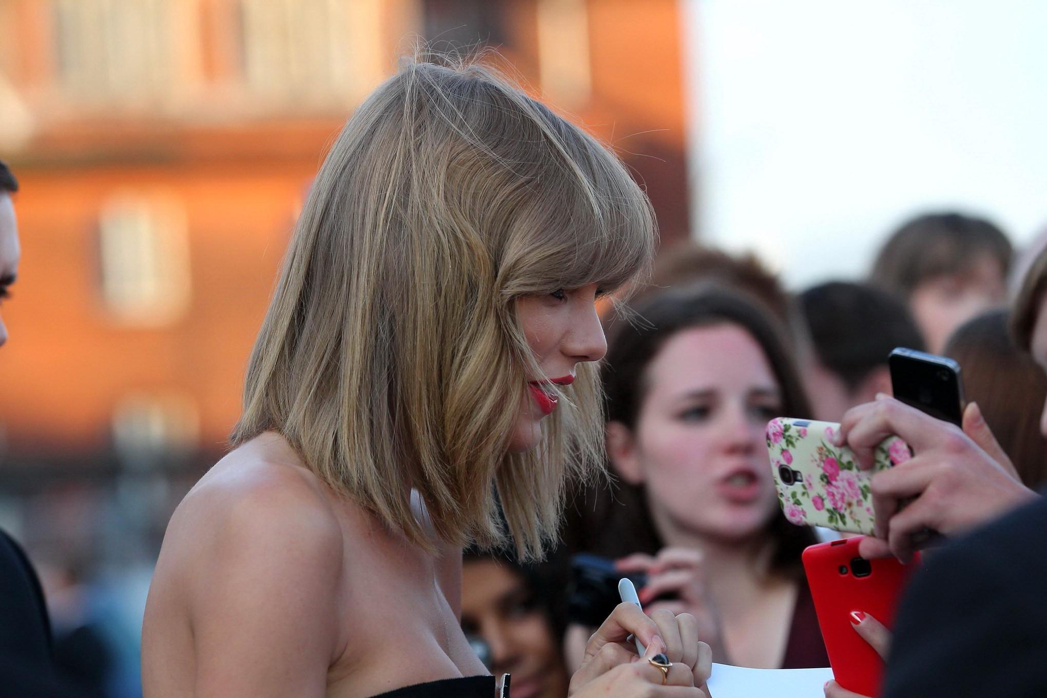 16P Taylor Swift braless showing cleavage at the 2014 German Radio Awards in Hamburg