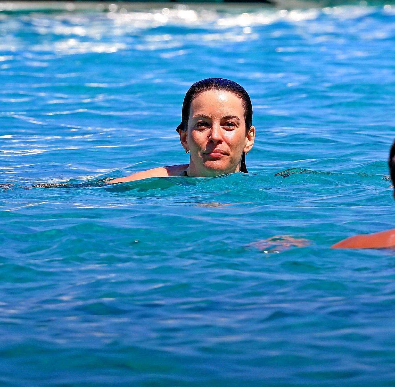 16P Liv Tyler shows off her ass wearing bikini on a yacht in Ibiza