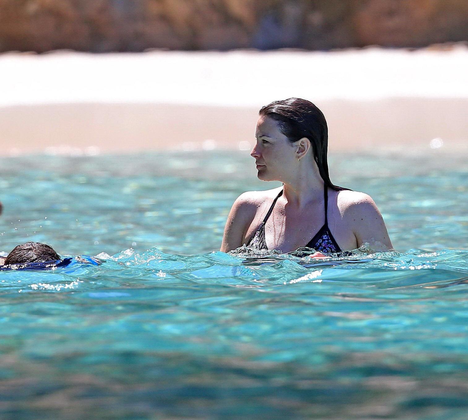 16P Liv Tyler shows off her ass wearing bikini on a yacht in Ibiza
