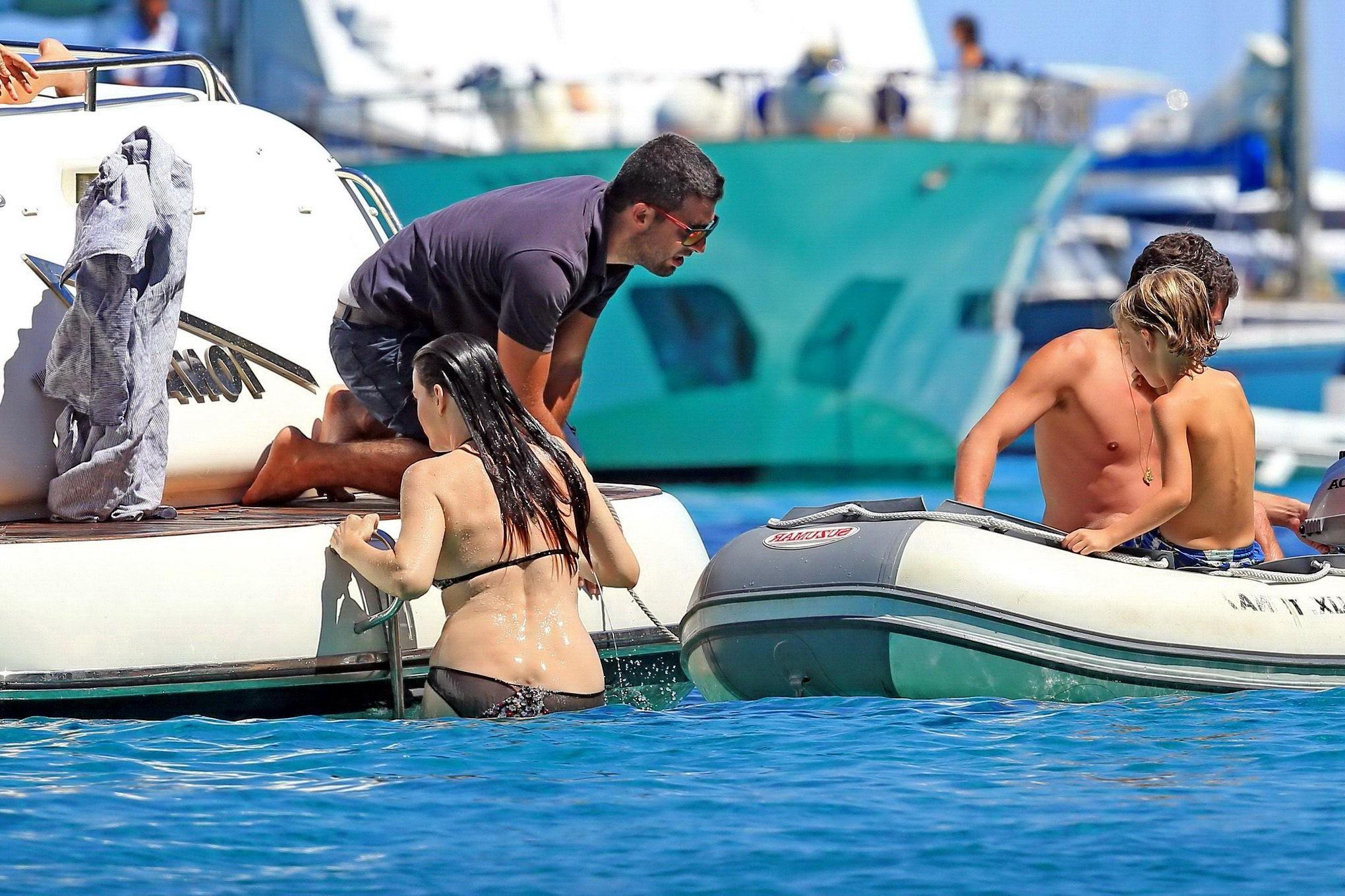 16P Liv Tyler shows off her ass wearing bikini on a yacht in Ibiza