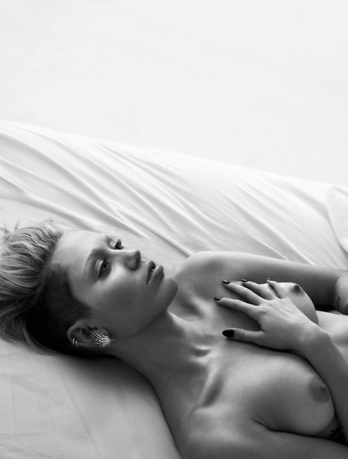15P Miley Cyrus topless in magazine photoshoot
