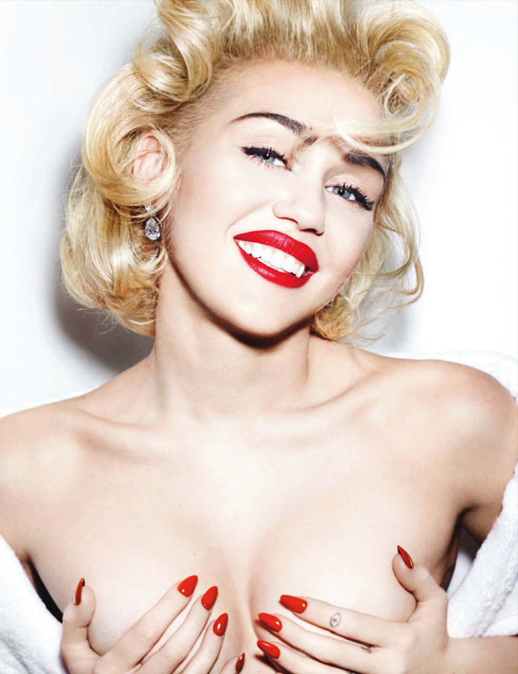 15P Miley Cyrus topless in magazine photoshoot