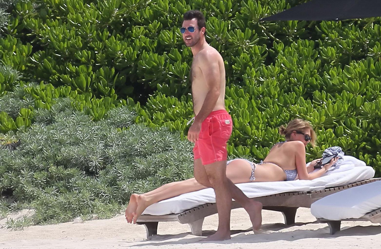 16P Kate Upton tanning her milky melons and ass in silver bikini at the beach in Mex
