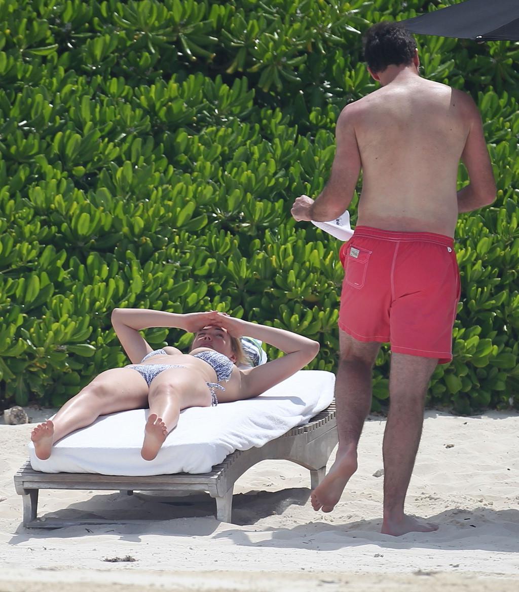 16P Kate Upton tanning her milky melons and ass in silver bikini at the beach in Mex