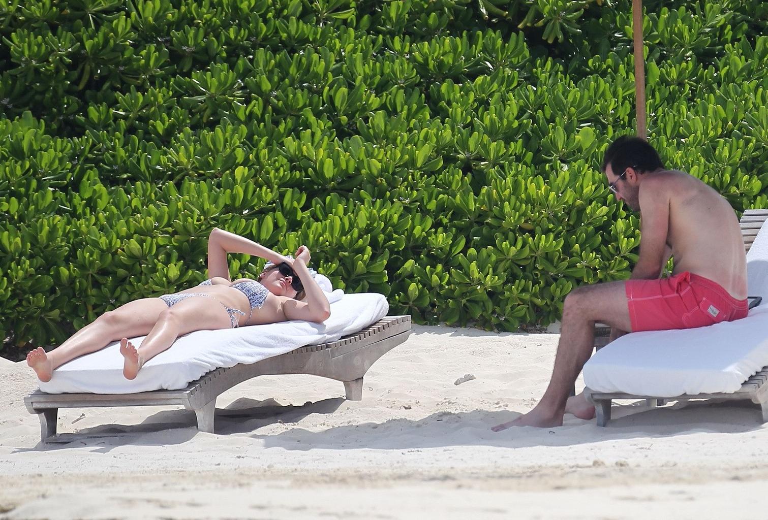 16P Kate Upton tanning her milky melons and ass in silver bikini at the beach in Mex