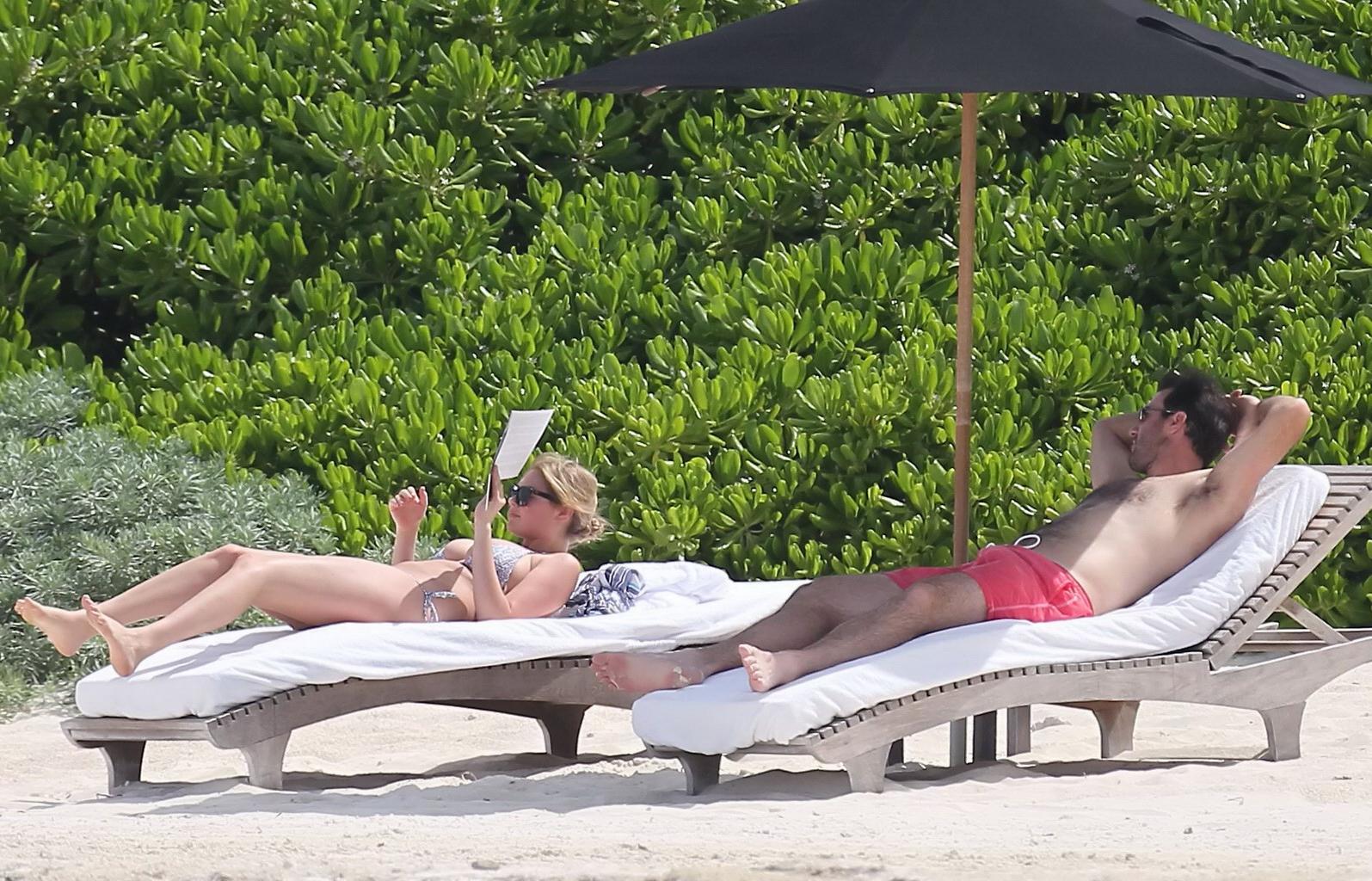 16P Kate Upton tanning her milky melons and ass in silver bikini at the beach in Mex