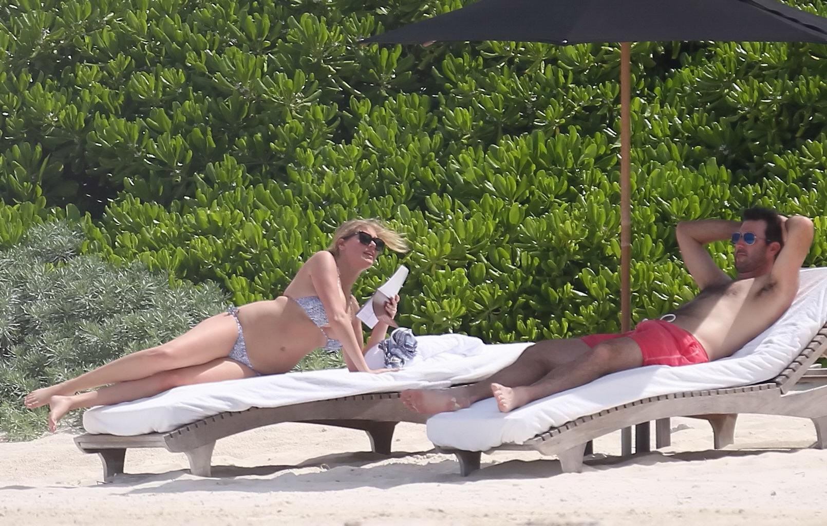 16P Kate Upton tanning her milky melons and ass in silver bikini at the beach in Mex