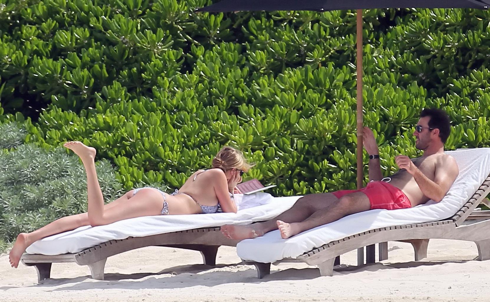 16P Kate Upton tanning her milky melons and ass in silver bikini at the beach in Mex
