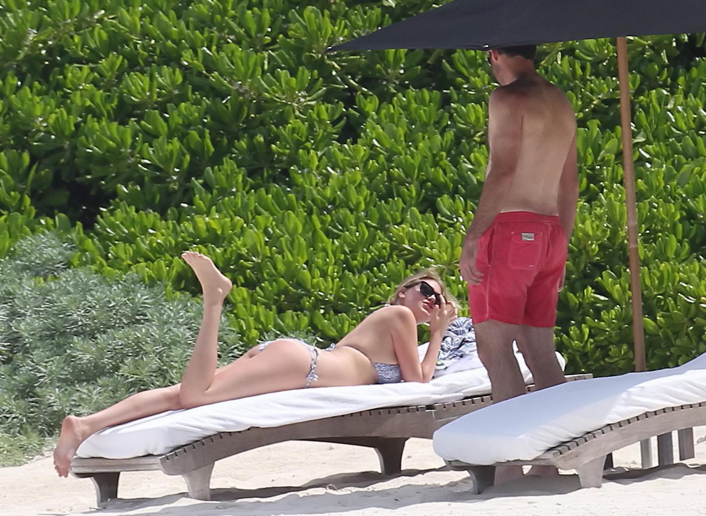 16P Kate Upton tanning her milky melons and ass in silver bikini at the beach in Mex