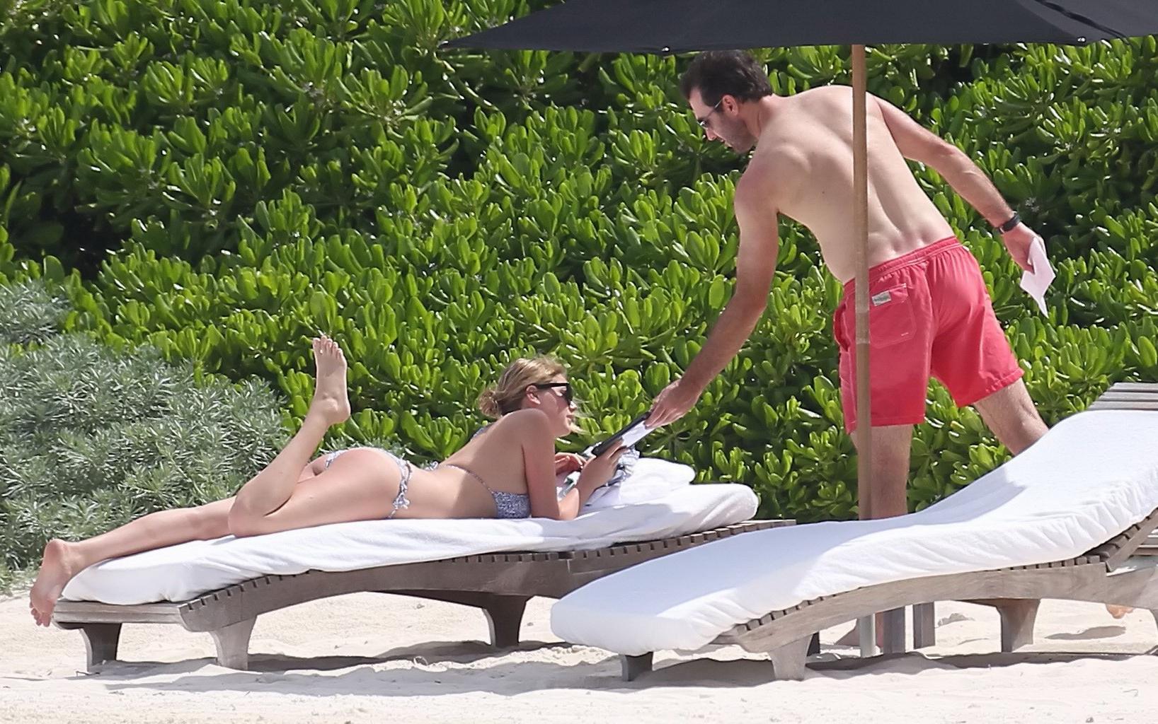 16P Kate Upton tanning her milky melons and ass in silver bikini at the beach in Mex