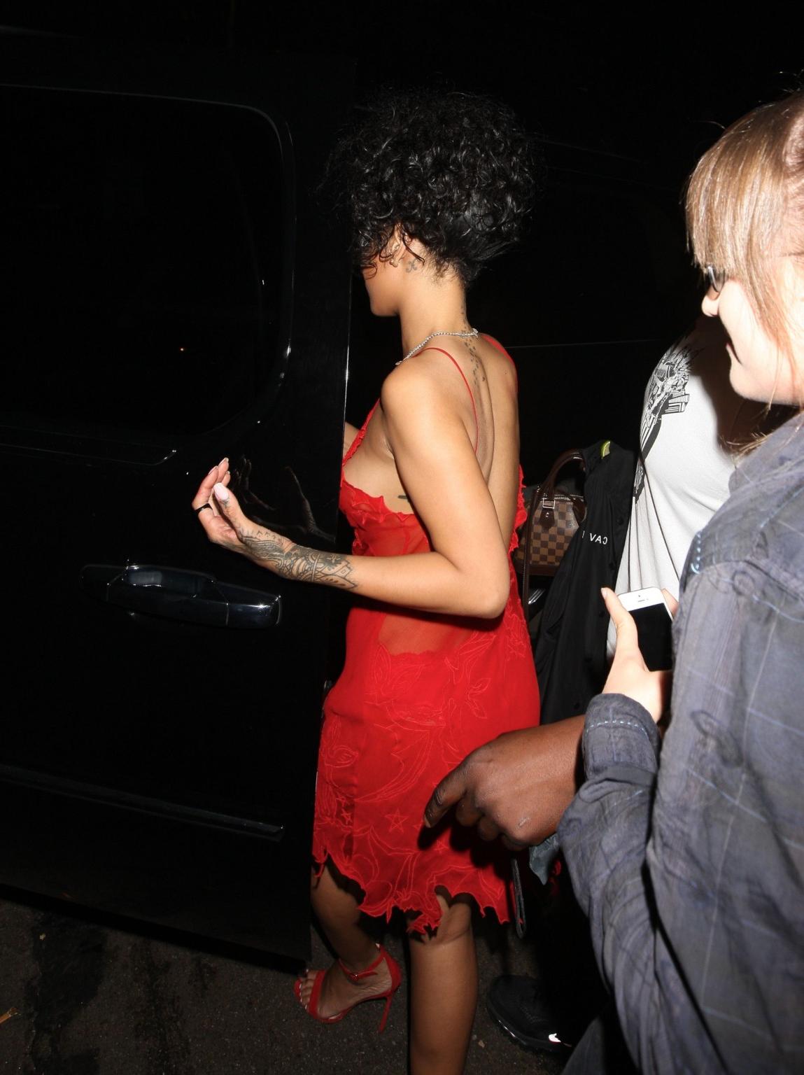 16P Rihanna shows off her boobs wearing a red see through dress at Hooray Henrys in 