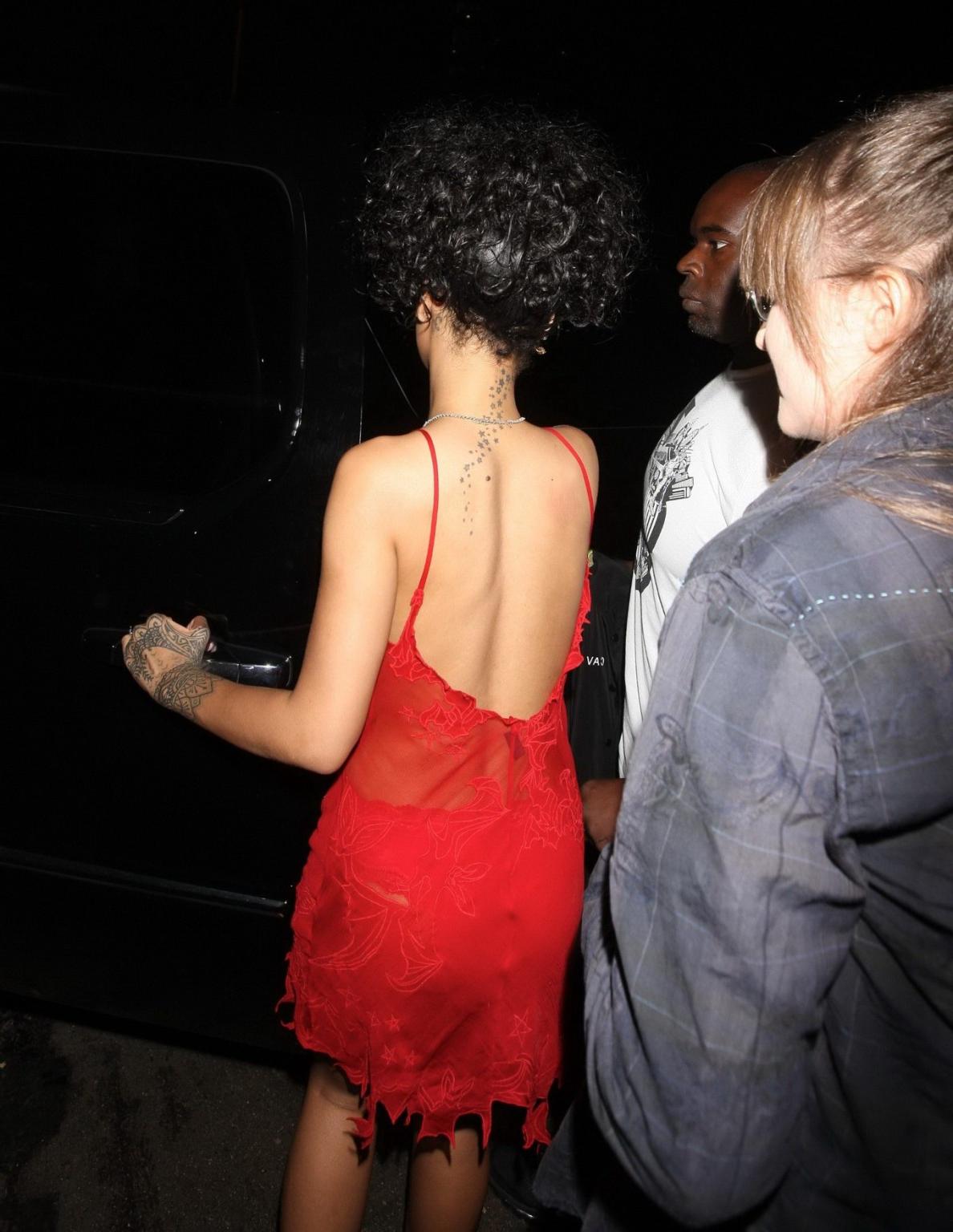 16P Rihanna shows off her boobs wearing a red see through dress at Hooray Henrys in 