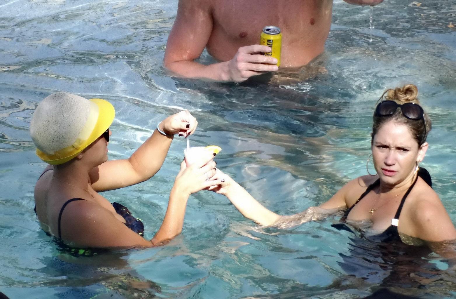 16P Kaley Cuoco busty wearing skimpy twopiece with her husband at the pool in Mexico