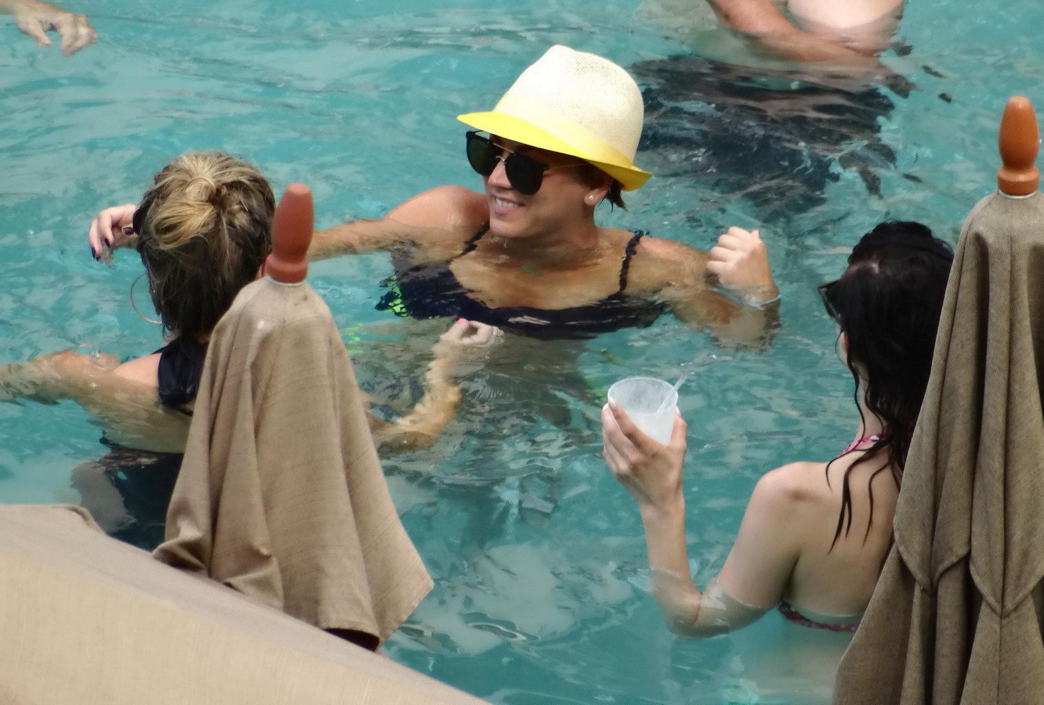 16P Kaley Cuoco busty wearing skimpy twopiece with her husband at the pool in Mexico