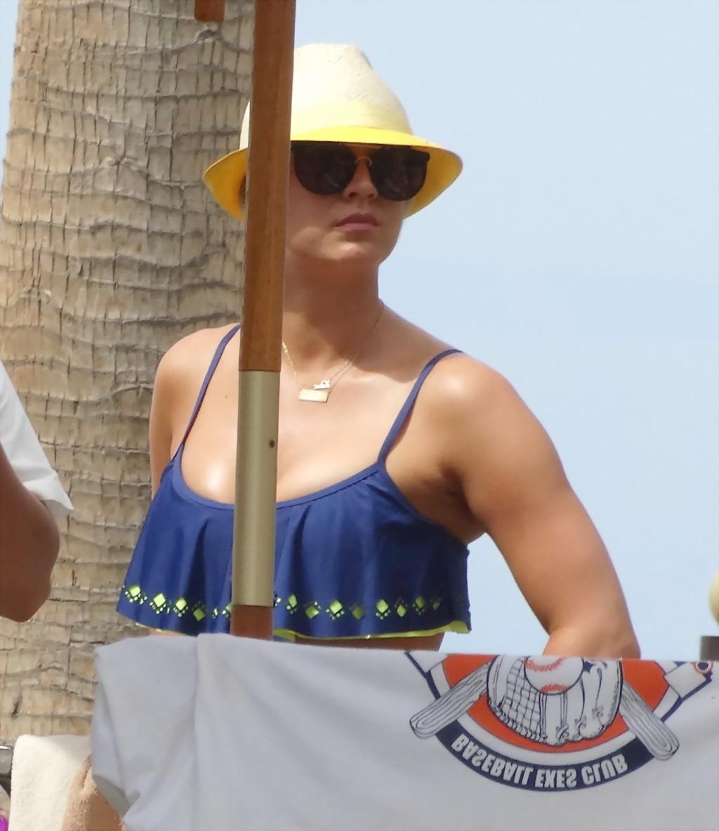 16P Kaley Cuoco busty wearing skimpy twopiece with her husband at the pool in Mexico